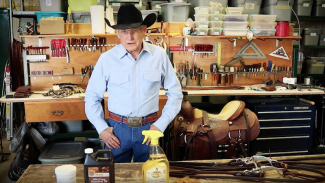 Dennis Moreland explaining how to clean a saddle